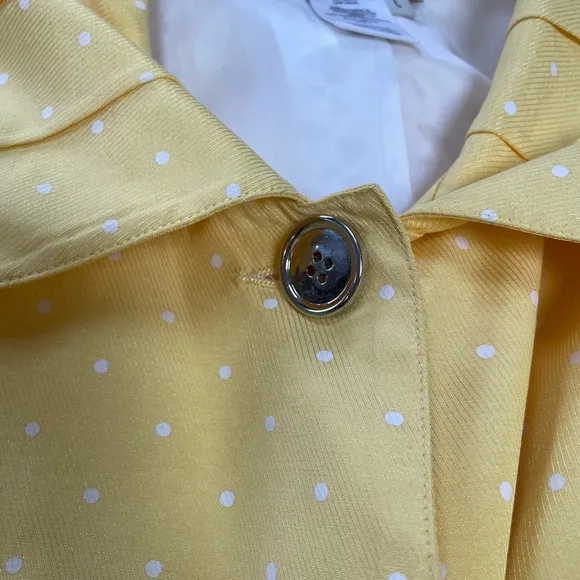 A La Carte yellow dot lightweight jacket. Pockets, lined.  Size Large.