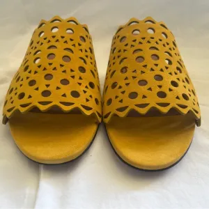 Alaïa Leather slip ons laser cut vienne cut outs. NWT. Mustard color.