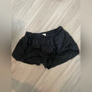 Anthropologie 100% linen black shorts with elastic band