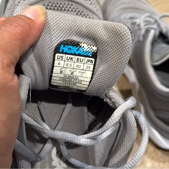 Hoka One One AKASA Size 8 Gray and White Athletic Shoes with Modern Silhouette