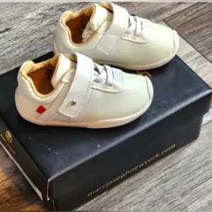 Marc Joseph White Nappa/Patent infant size 6 shoe.
