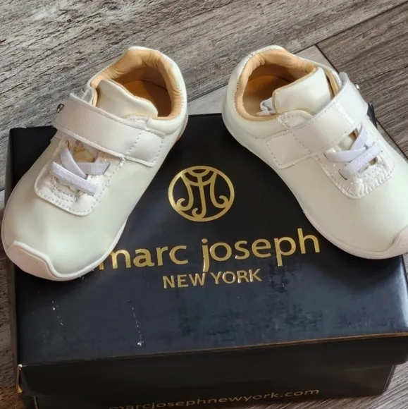 Marc Joseph White Nappa/Patent infant size 6 shoe.