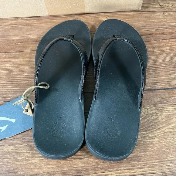 NEW Olukai Puawe Black Flip-Flops Sandals Slip-On Shoes Women’s Size 6