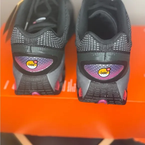 Nike Black and White Athletic Shoes with 3D Textured Design