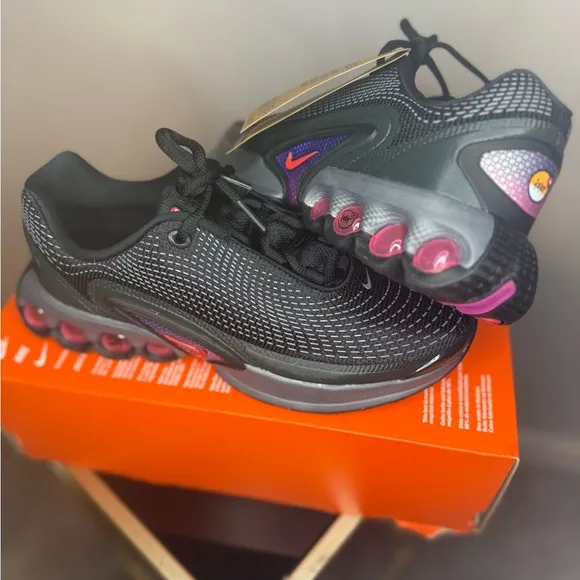Nike Black and White Athletic Shoes with 3D Textured Design