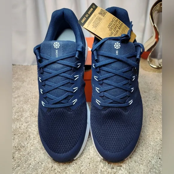 Nike Blue and White Athletic Shoes with Sleek Design