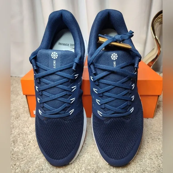 Nike Blue and White Athletic Shoes with Sleek Design