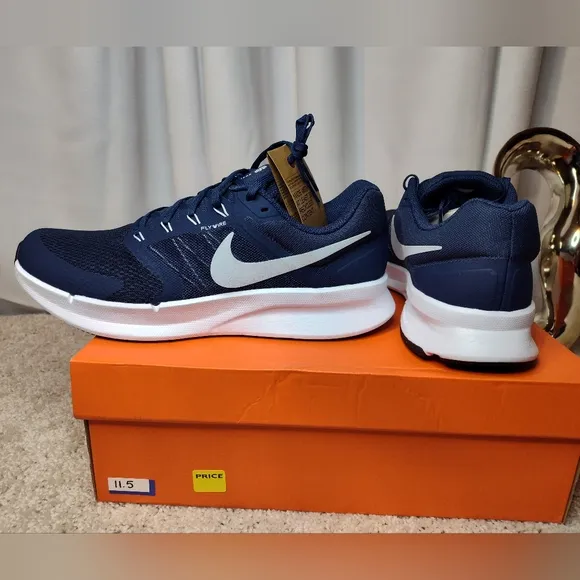 Nike Blue and White Athletic Shoes with Sleek Design