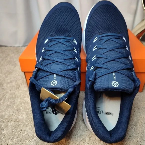Nike Blue and White Athletic Shoes with Sleek Design