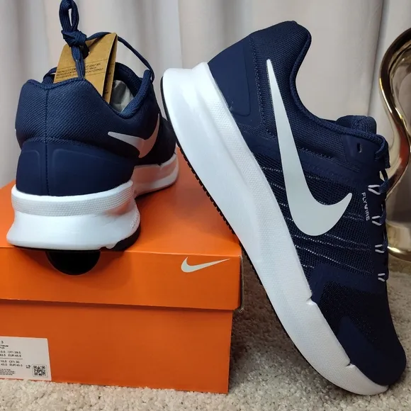 Nike Blue and White Athletic Shoes with Sleek Design