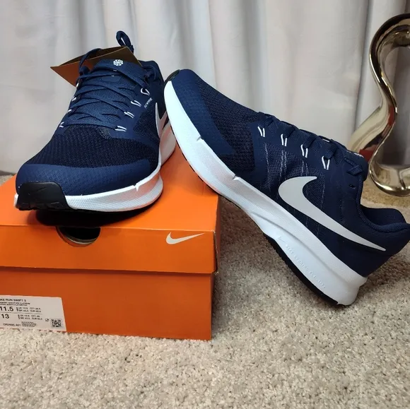 Nike Blue and White Athletic Shoes with Sleek Design