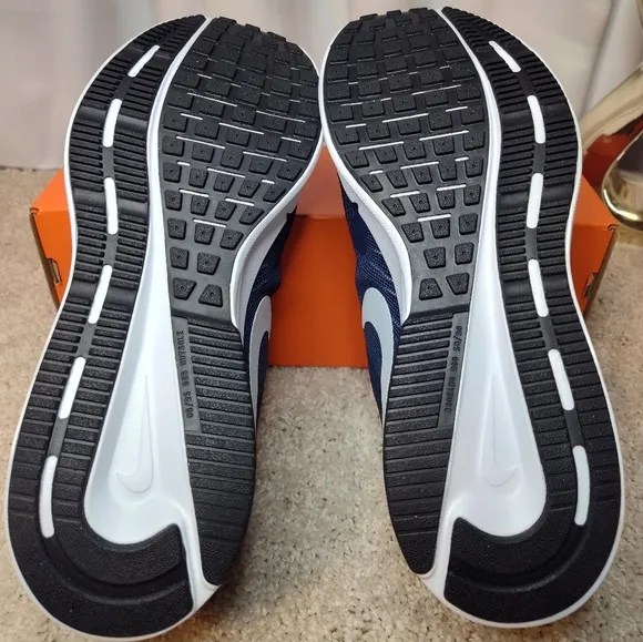Nike Blue and White Athletic Shoes with Sleek Design
