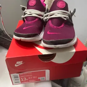 Nike Kids Shoes in Purple and Pink
