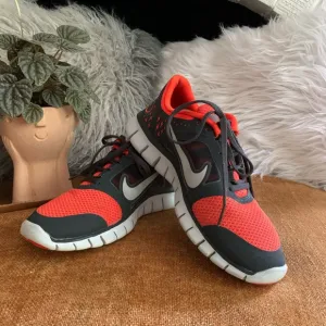 Orange Nike Free Runs Running Shoe