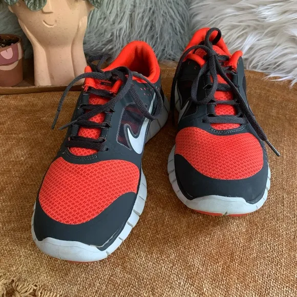 Orange Nike Free Runs Running Shoe