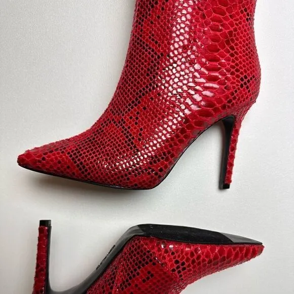 Red snake print knee high boots