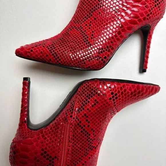 Red snake print knee high boots