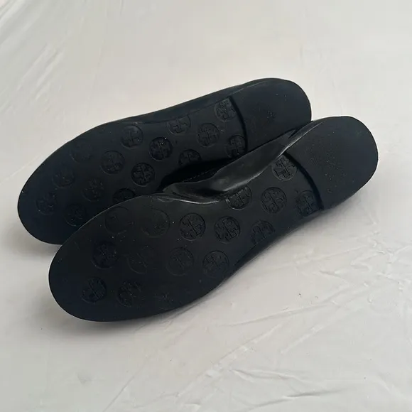 Tory Burch Reva black patent leather round medallion logo travel flat shoes